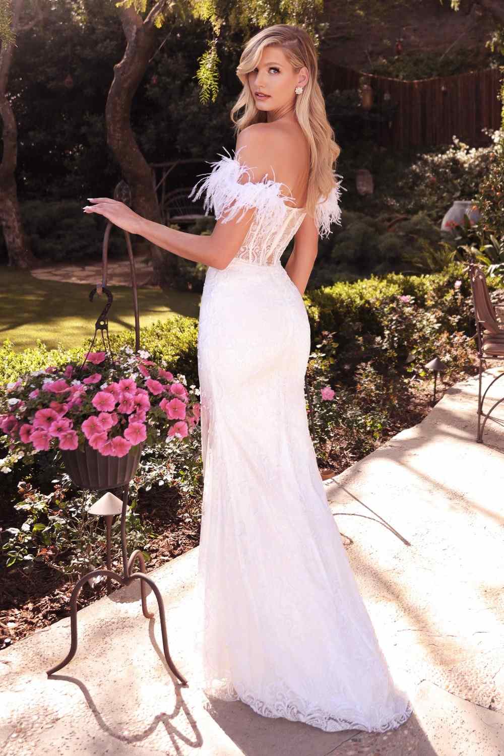 Off-white fitted bridal gown with off-shoulder feathers and sheer lace overlay