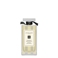 Jo Malone bath oil in clear box with black ribbon; yellow liquid bottle inside