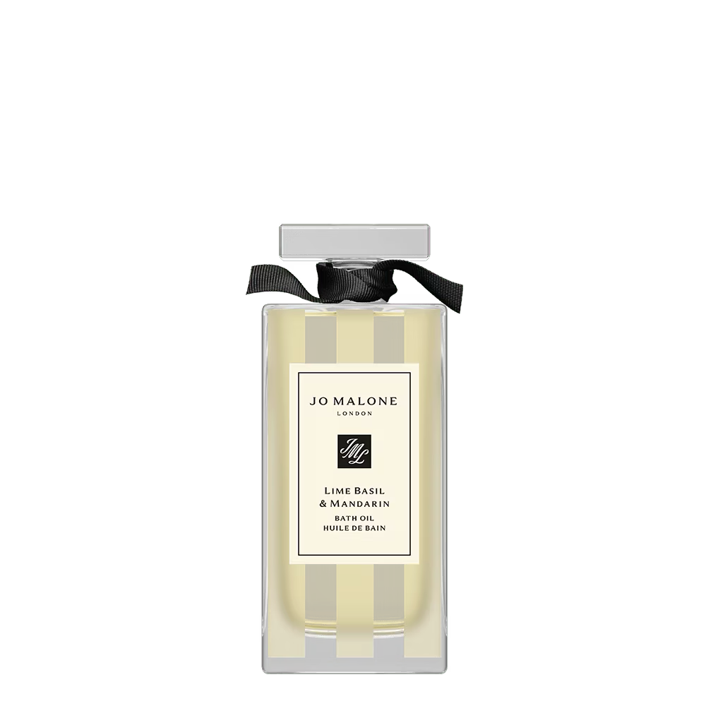 Jo Malone bath oil in clear box with black ribbon; yellow liquid bottle inside