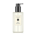 Body and hand wash bottle with black pump, clear bottle, cream label