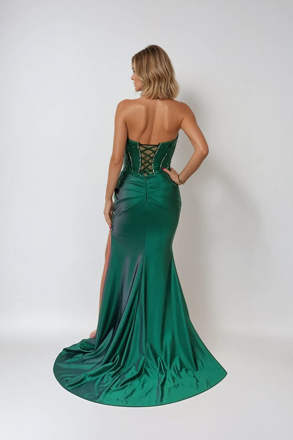Back view satin prom gown, deep green, crisscross lace-up corset and full skirt