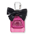 Eau de parfum bottle with black bow, faceted cap, and pink liquid
