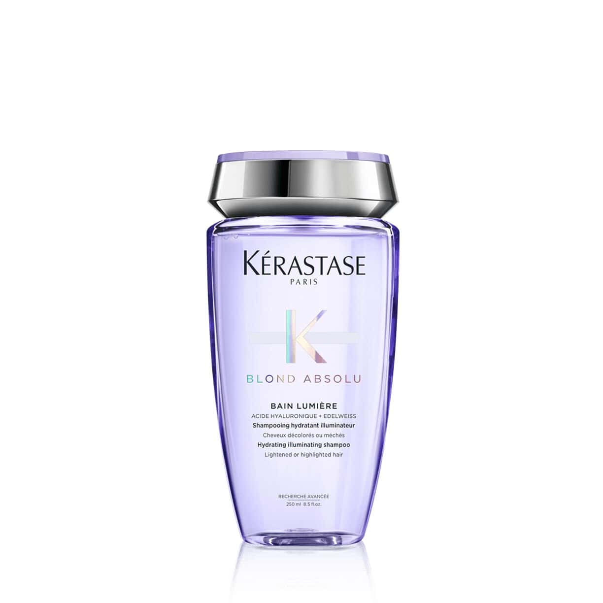 Kerastase Bain Lumiere Blond Absolu shampoo bottle, clear purple plastic with purple cap