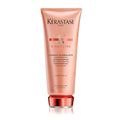 Kérastase Discipline fondant conditioner tube, peach-pink.