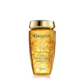 Kerastase Elixir Ultime shampoo bottle, amber bottle with gold cap