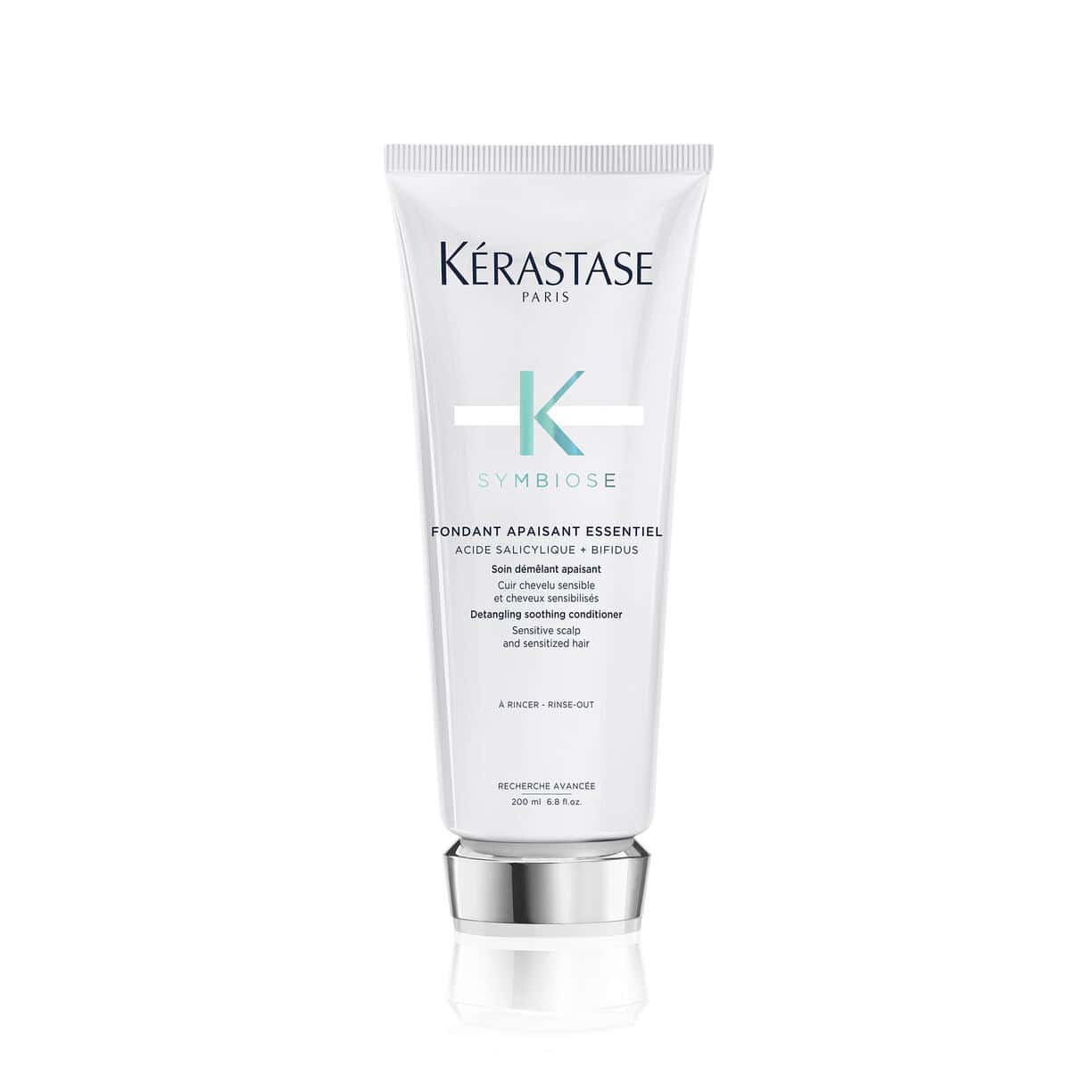 Kerastase Symbiose conditioner tube, white squeeze bottle with silver cap