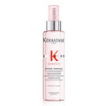Kérastase Genesis heat-protecting spray bottle with pink pump and clear nozzle