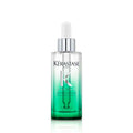 Kerastase Specifique hair & scalp serum bottle, clear green glass, silver cap