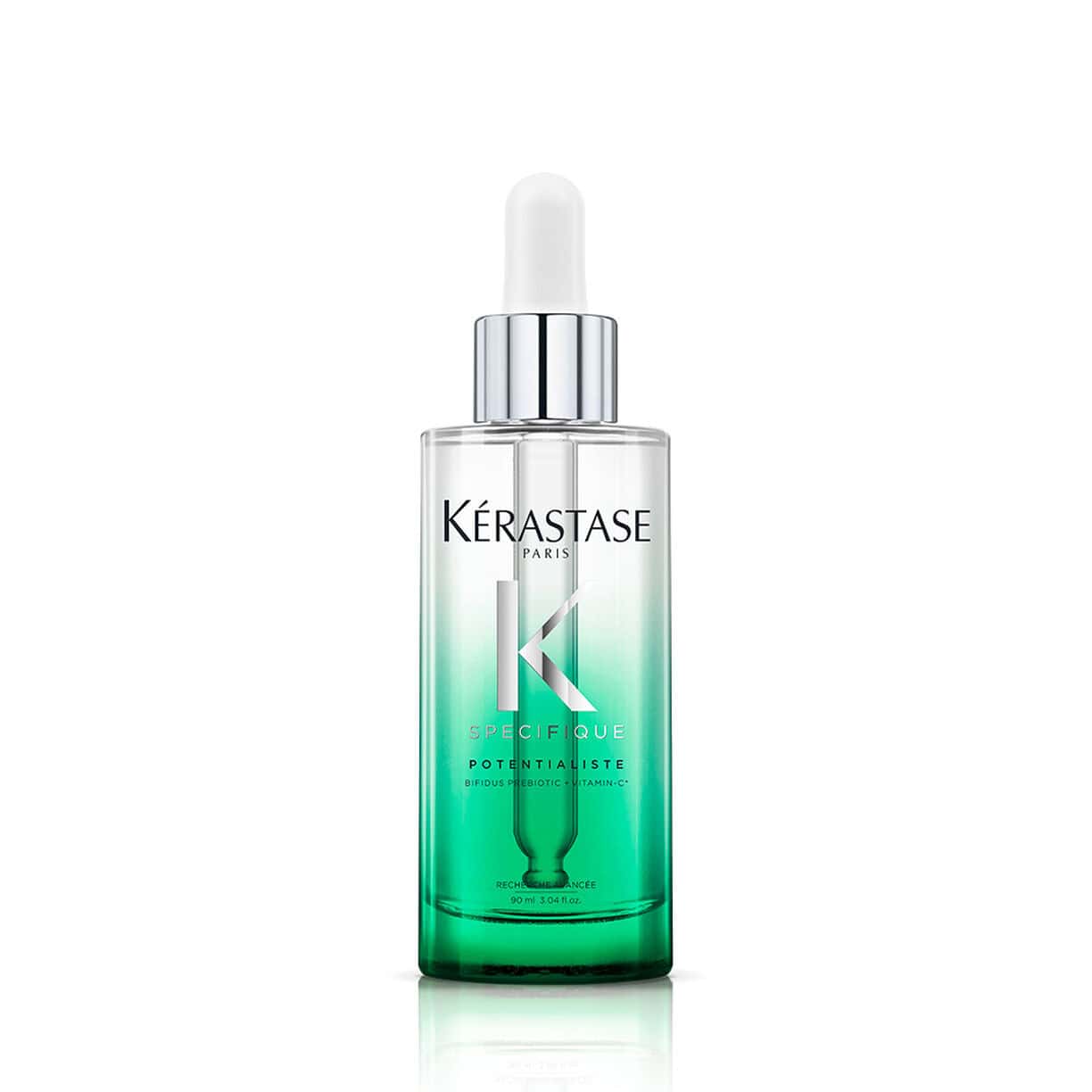 Kerastase Specifique hair & scalp serum bottle, clear green glass, silver cap
