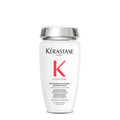 Kerastase Première repairing shampoo bottle, white plastic with silver cap
