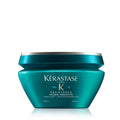 Turquoise Kérastase Resistance hair mask jar with teal lid and label