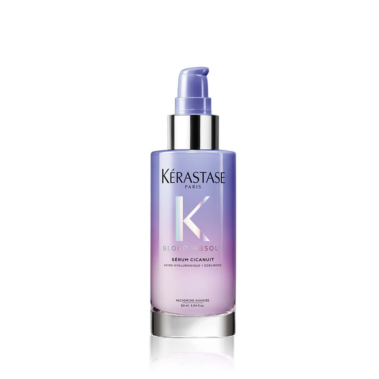 Kerastase hair serum bottle with silver pump, purple liquid, 3 oz