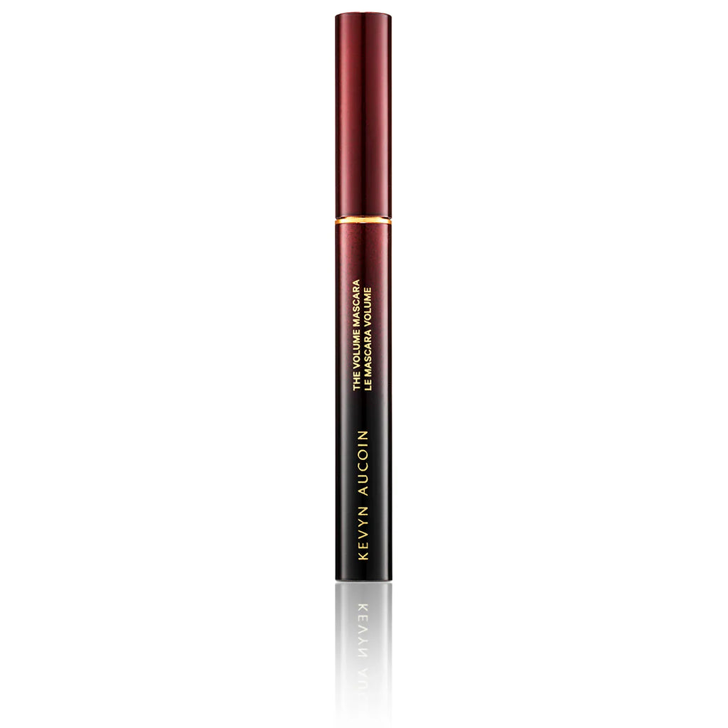Burgundy mascara tube with cap and applicator wand
