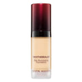 Illuminating foundation bottle with light beige shade, glossy red cap