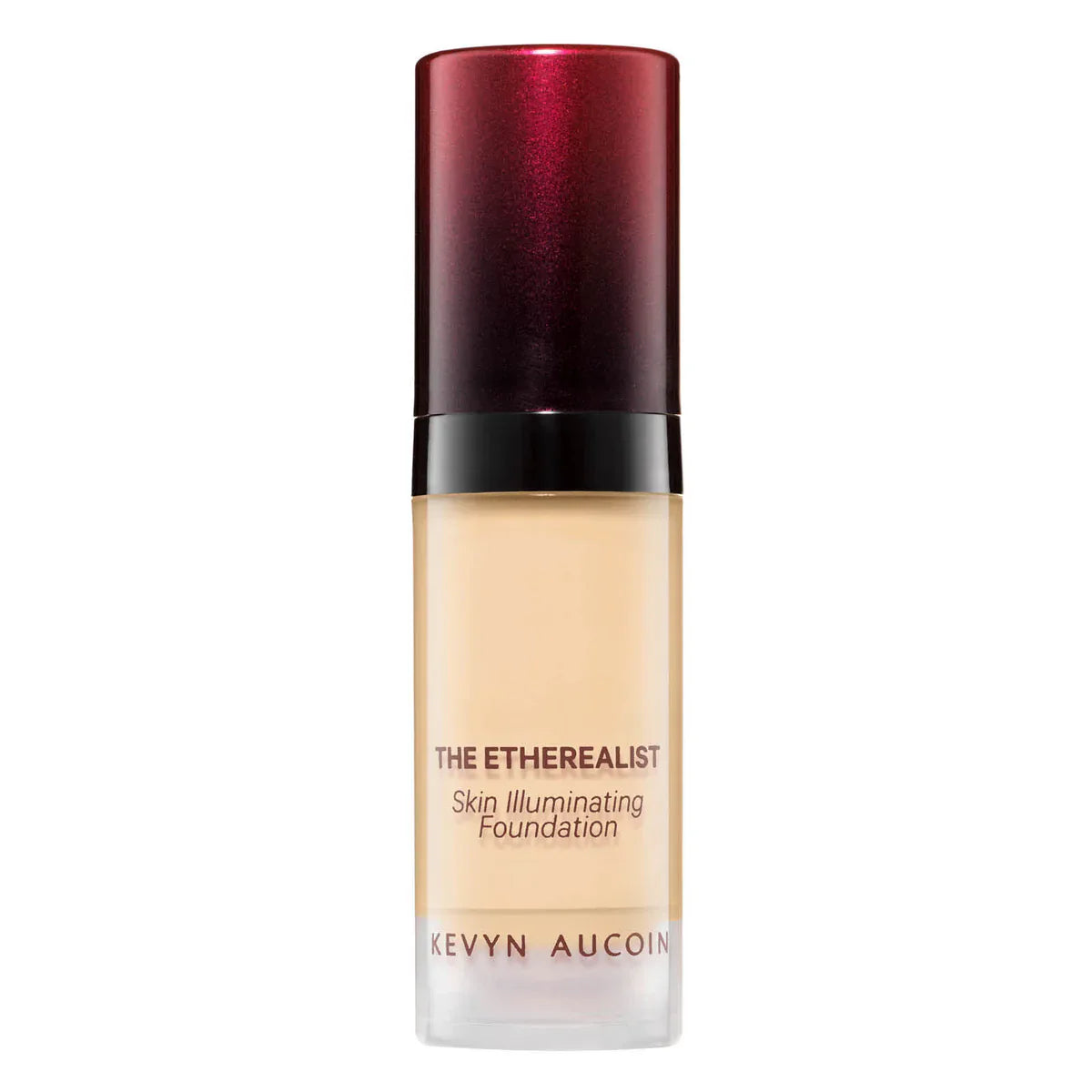 Illuminating foundation bottle with light beige shade, glossy red cap
