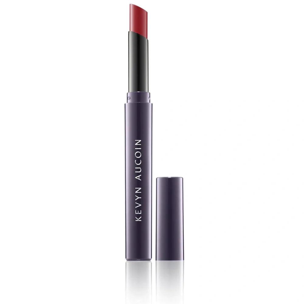 Kevyn Aucoin Unforgettable Lipstick Shine: mauve tube with coral-pink cap, bullet shown.