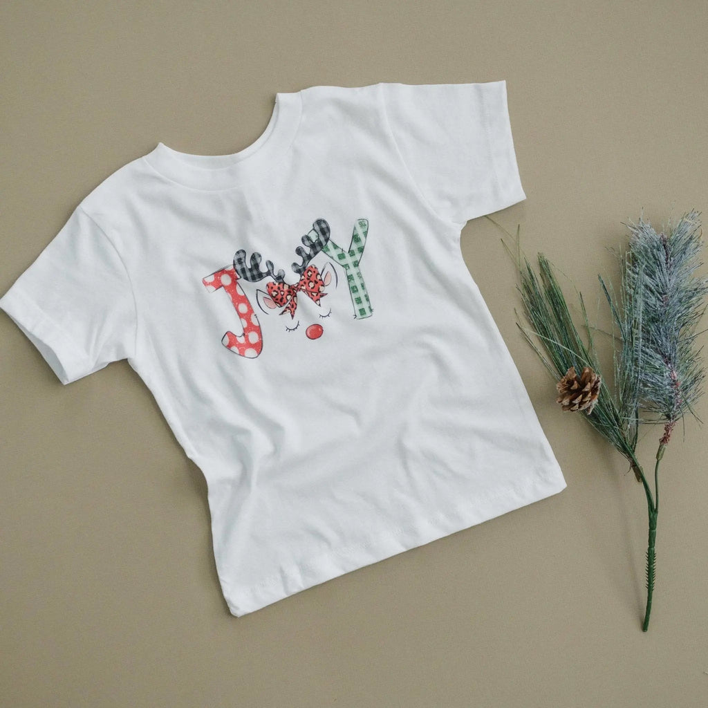 White kids t-shirt, short sleeves, with colorful reindeer and candy-cane front graphic