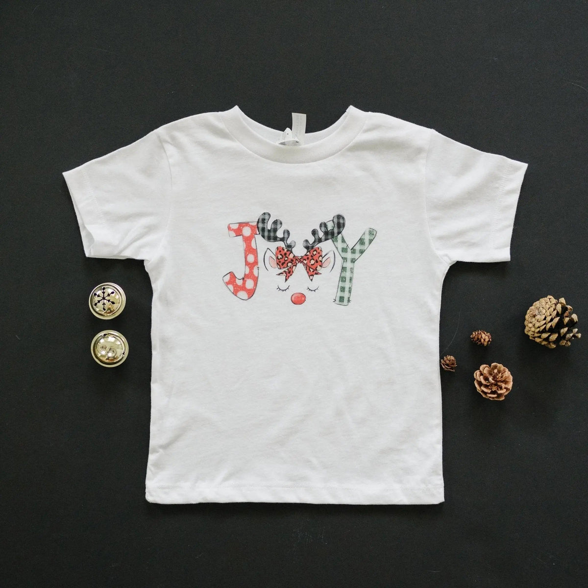 White kids t-shirt with colorful reindeer and candy-cane graphic, short sleeves