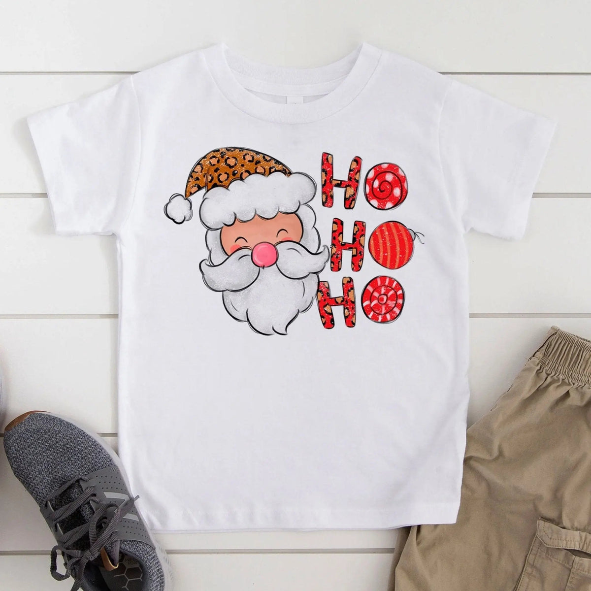 Kids white Santa Christmas T-shirt with "Ho Ho Ho" graphic and red text