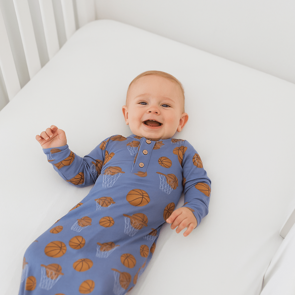 Blue baby gown with long sleeves, basketball print, button front
