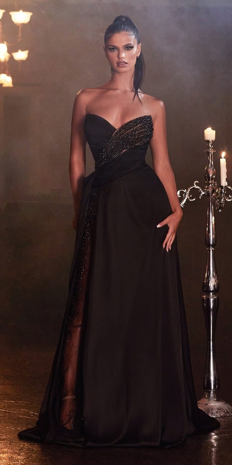 Black strapless floor-length gown with sparkly bodice and flowing skirt