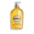 L'Occitane almond shower oil bottle with pump, amber glass, 16.9 oz