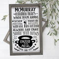 Large rustic kitchen rules sign with wooden frame and "MCMURRAY" kitchen text