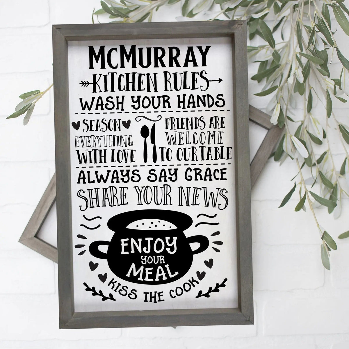 Large rustic kitchen rules sign with wooden frame and "MCMURRAY" kitchen text