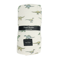 Legendary cloud blanket, white with green and blue dinosaur print, Sweet Bamboo label