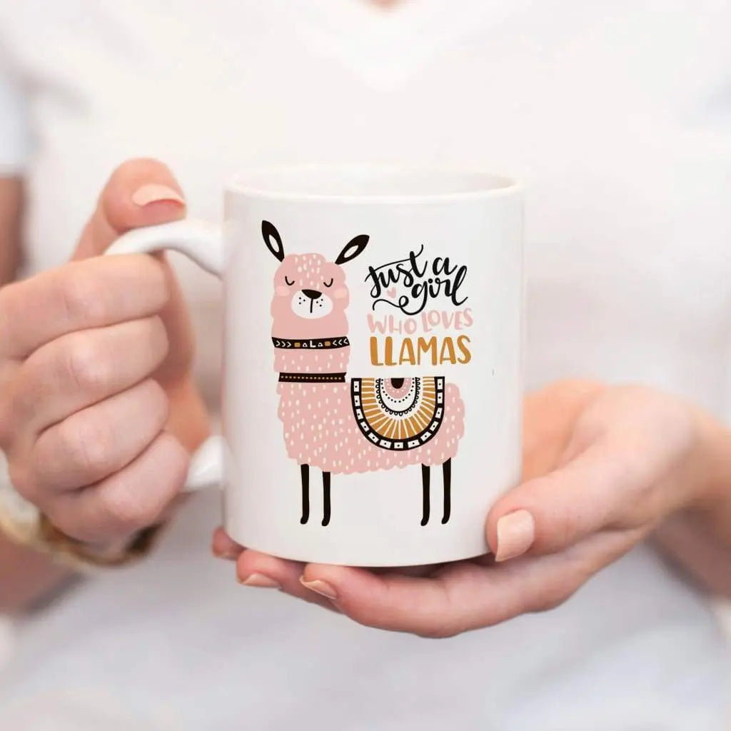 White coffee mug with llama illustration and slogan text
