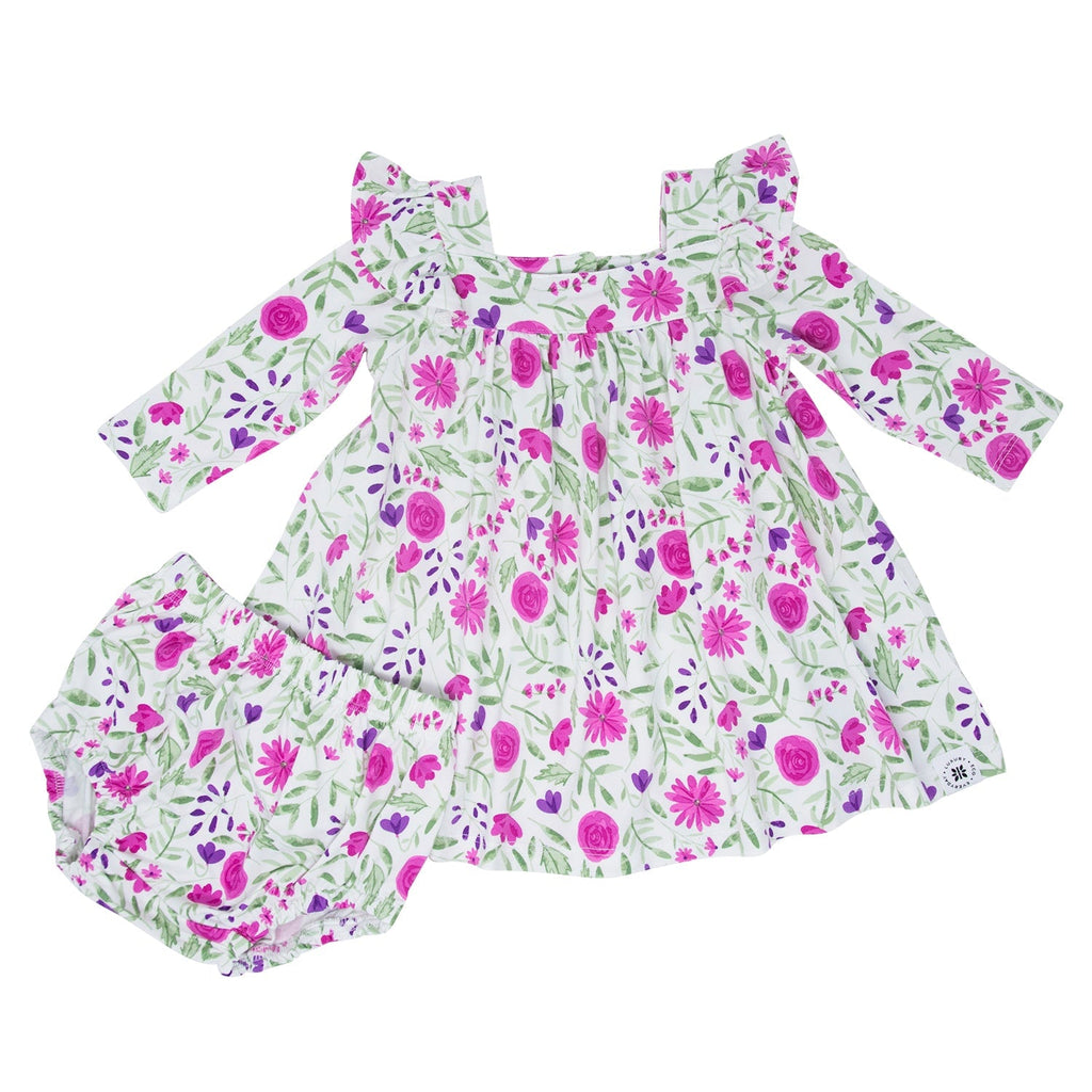 Girls ruffle dress in white with pink-purple floral print and bloomers