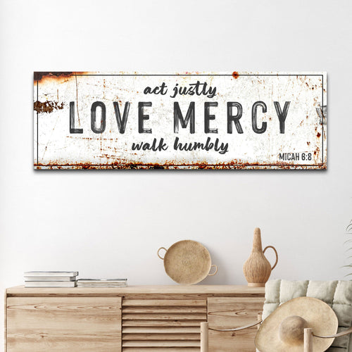 Rustic canvas wall sign with “LOVE MERCY” and “act justly, walk humbly” text