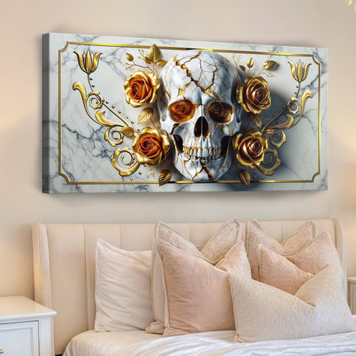 Skull and rose canvas wall art with gold ornamental frame on white marble backdrop.