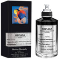 Maison Margiela Replica Flying eau de parfum spray bottle with black cap, 3.4 oz
