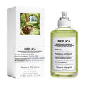 Maison Margiela Replica EDT bottle with green glass and white label, in box