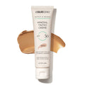 Mineral tinted crème SPF 30 in a white squeeze tube with beige swatch