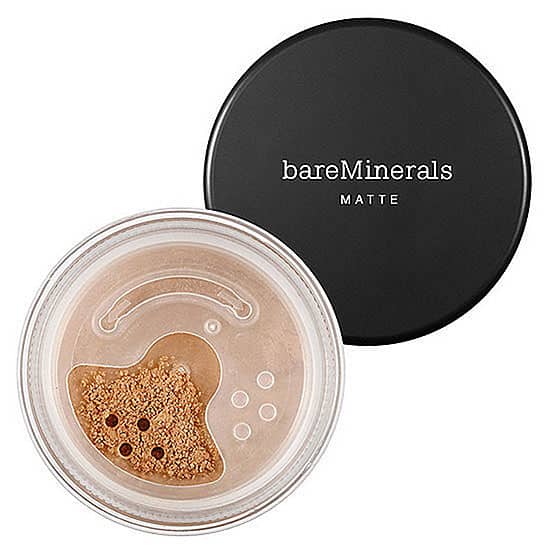 Matte foundation compact with black lid and open jar showing pale beige powder