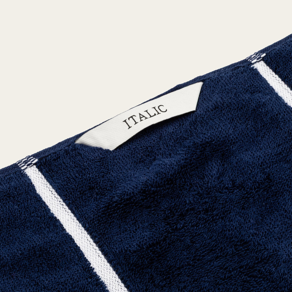 Navy cotton towel edge with white stripe border and ITALIO label