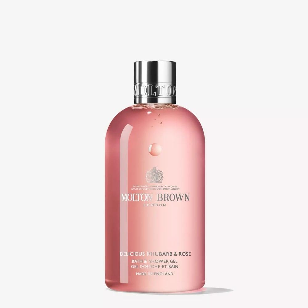 Molton Brown rhubarb & rose bath and shower gel bottle, pink with silver cap