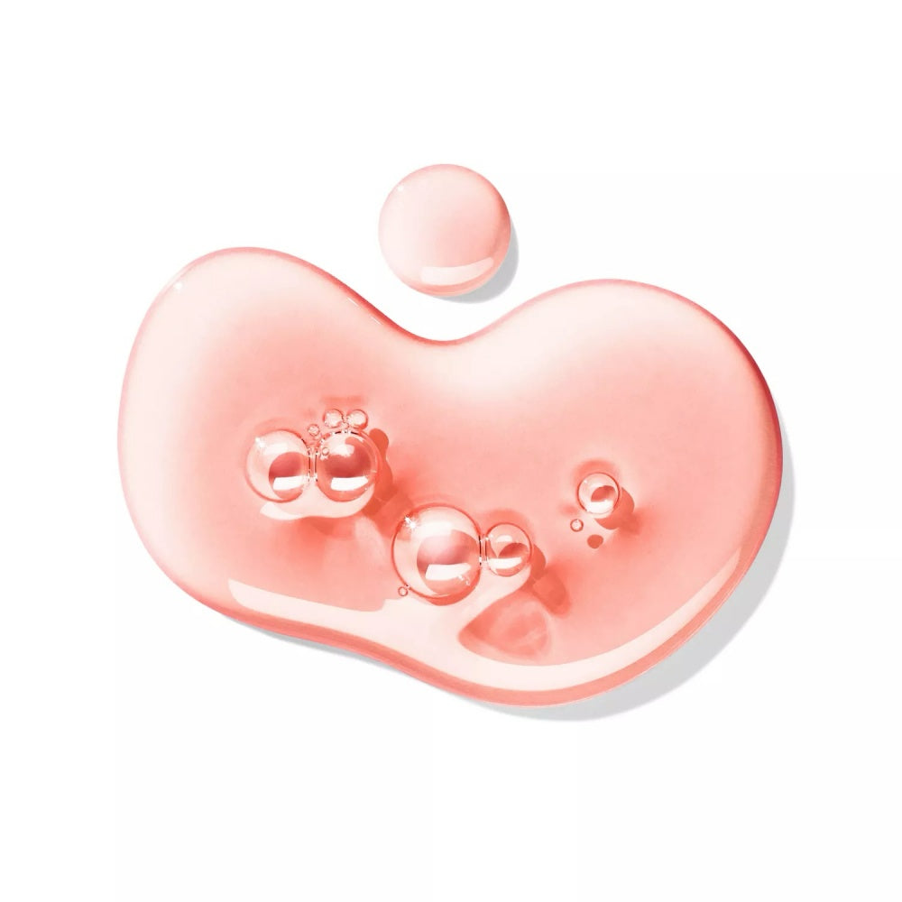 Peach-pink heart-shaped gel with water droplets
