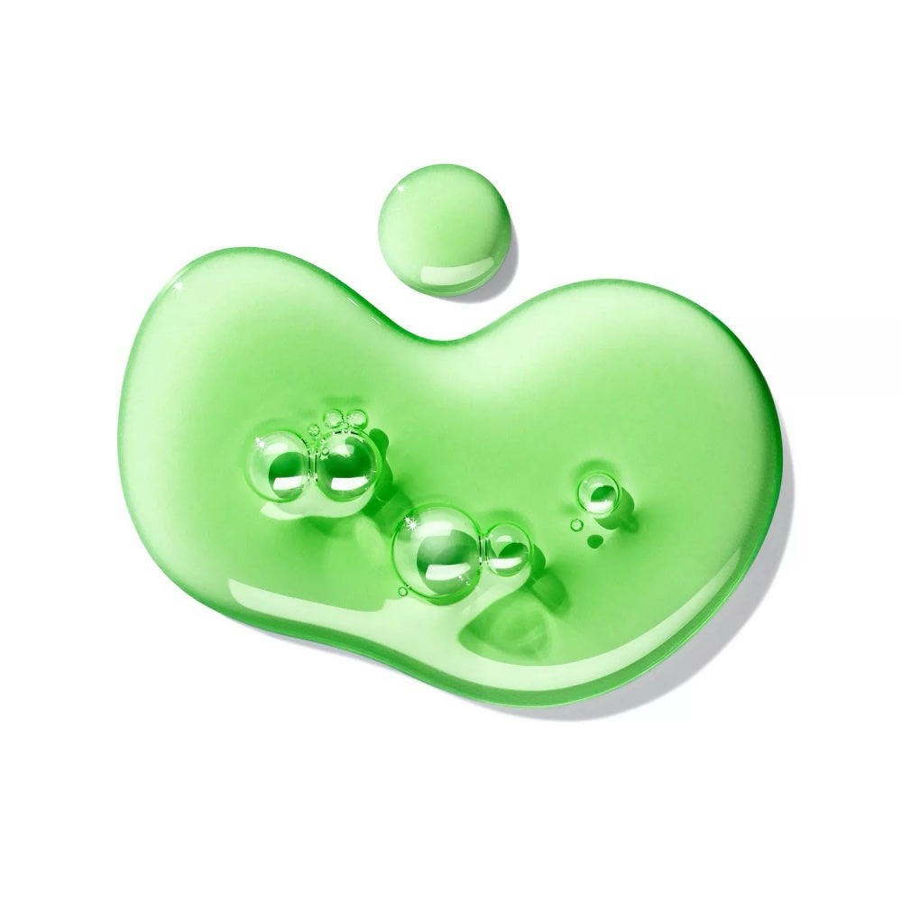 Green heart-shaped gel with bubbles, glossy bath and shower gel texture