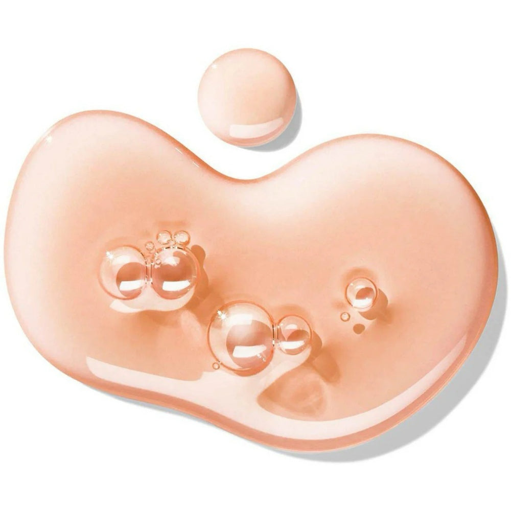 Heart-shaped bath gel in peach-pink, glossy with small bubbles.