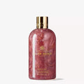 Molton Brown Rose Dunes bath & shower gel, clear pink bottle with gold cap