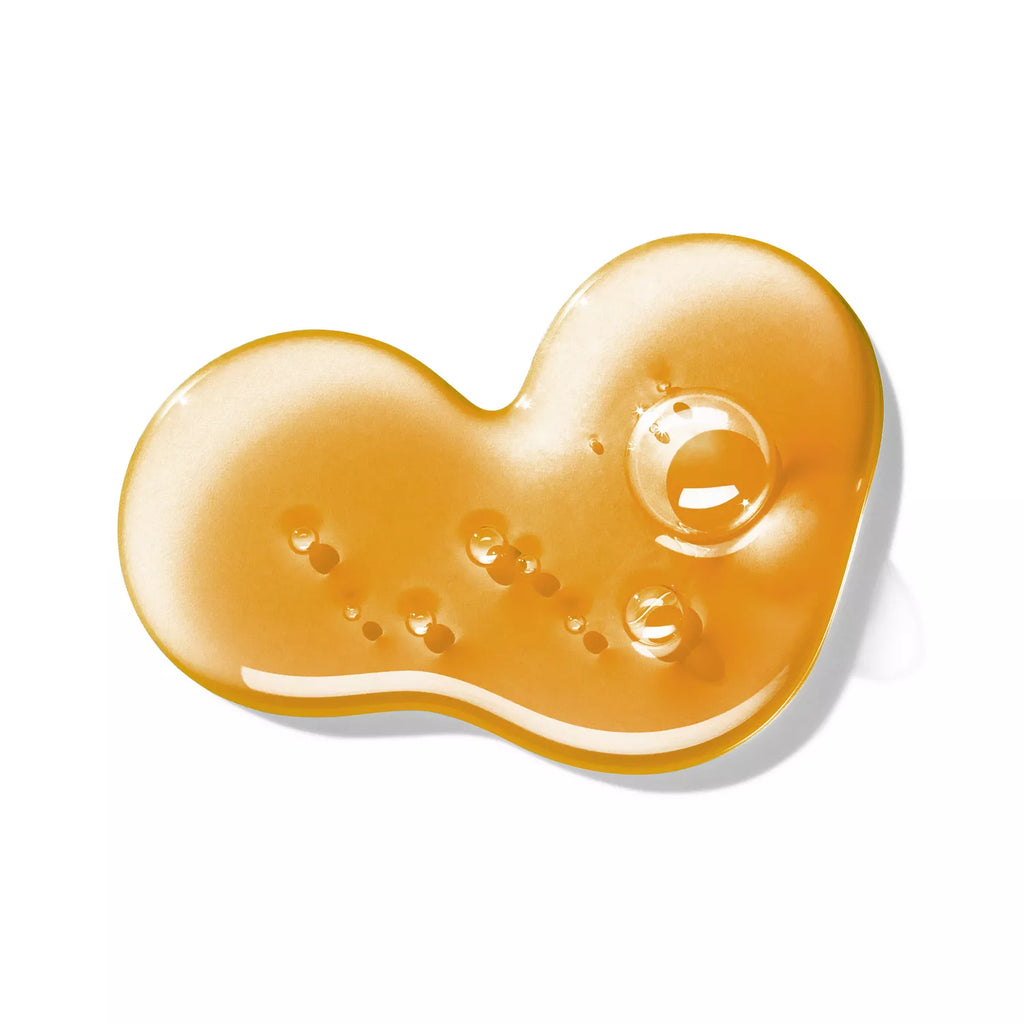 Amber gel swatch with glossy bubbles