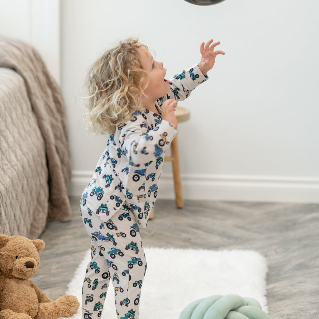 Toddler crew neck jogger set with colorful tractor print, long sleeves and cuffed joggers