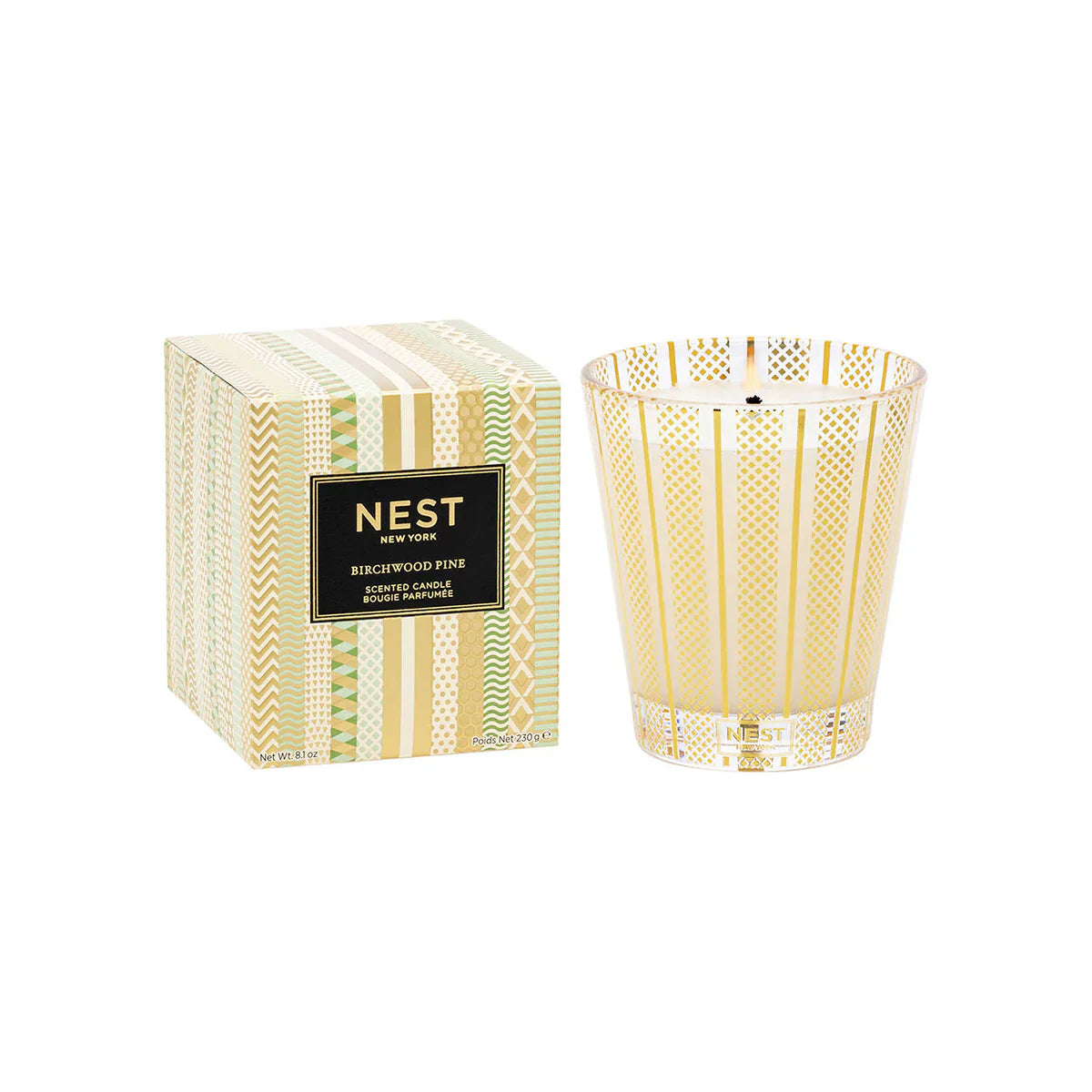 Birchwood pine scented candle in white patterned glass jar with perforated design