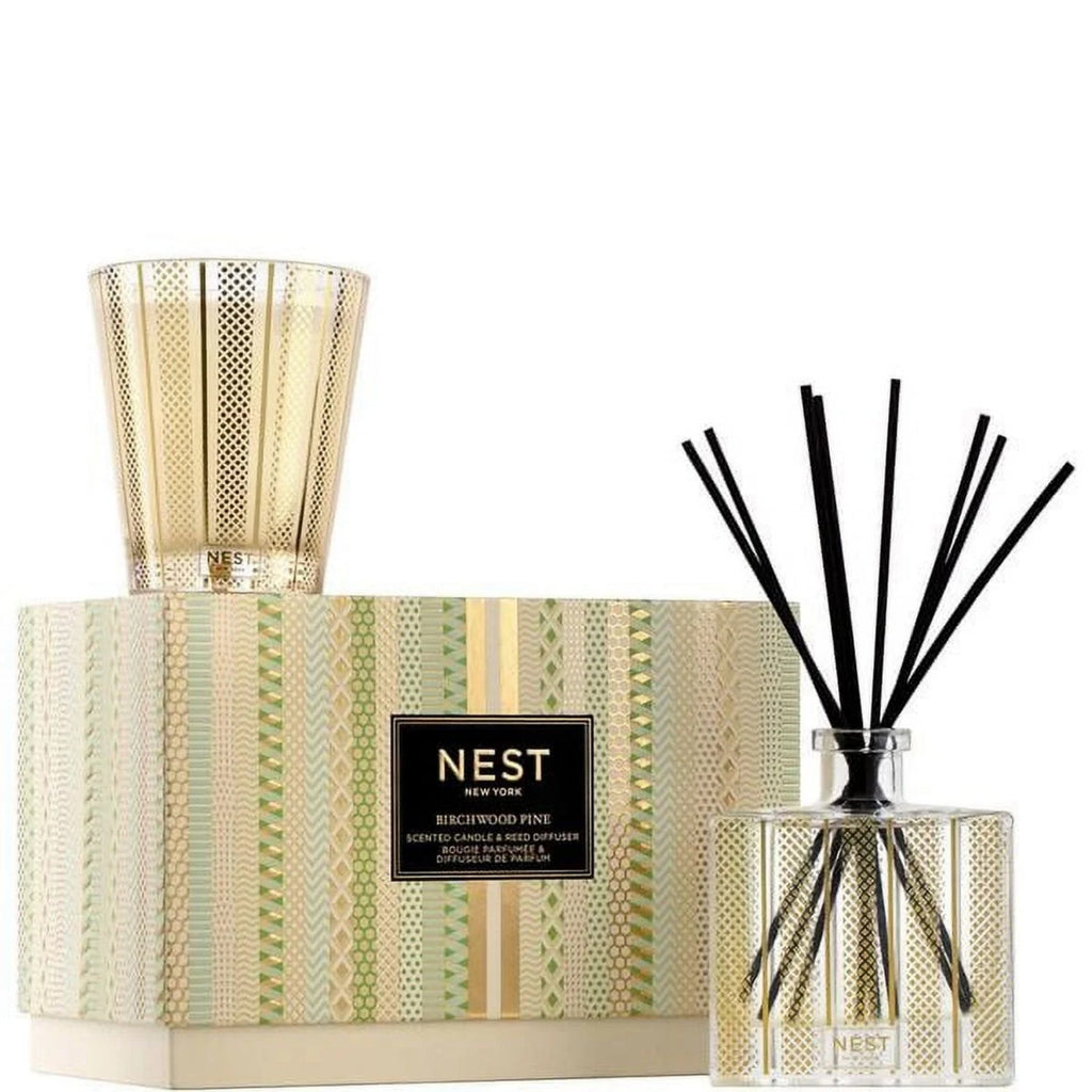 Candle and reed diffuser set with birchwood pine scent; patterned candle and diffuser bottle