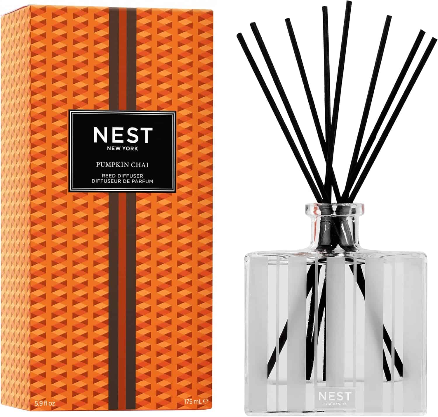 Pumpkin Chai reed diffuser set with clear glass bottle and black reed stems