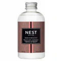 Diffuser refill bottle with Rose Noir & Oud label, clear liquid, silver cap
