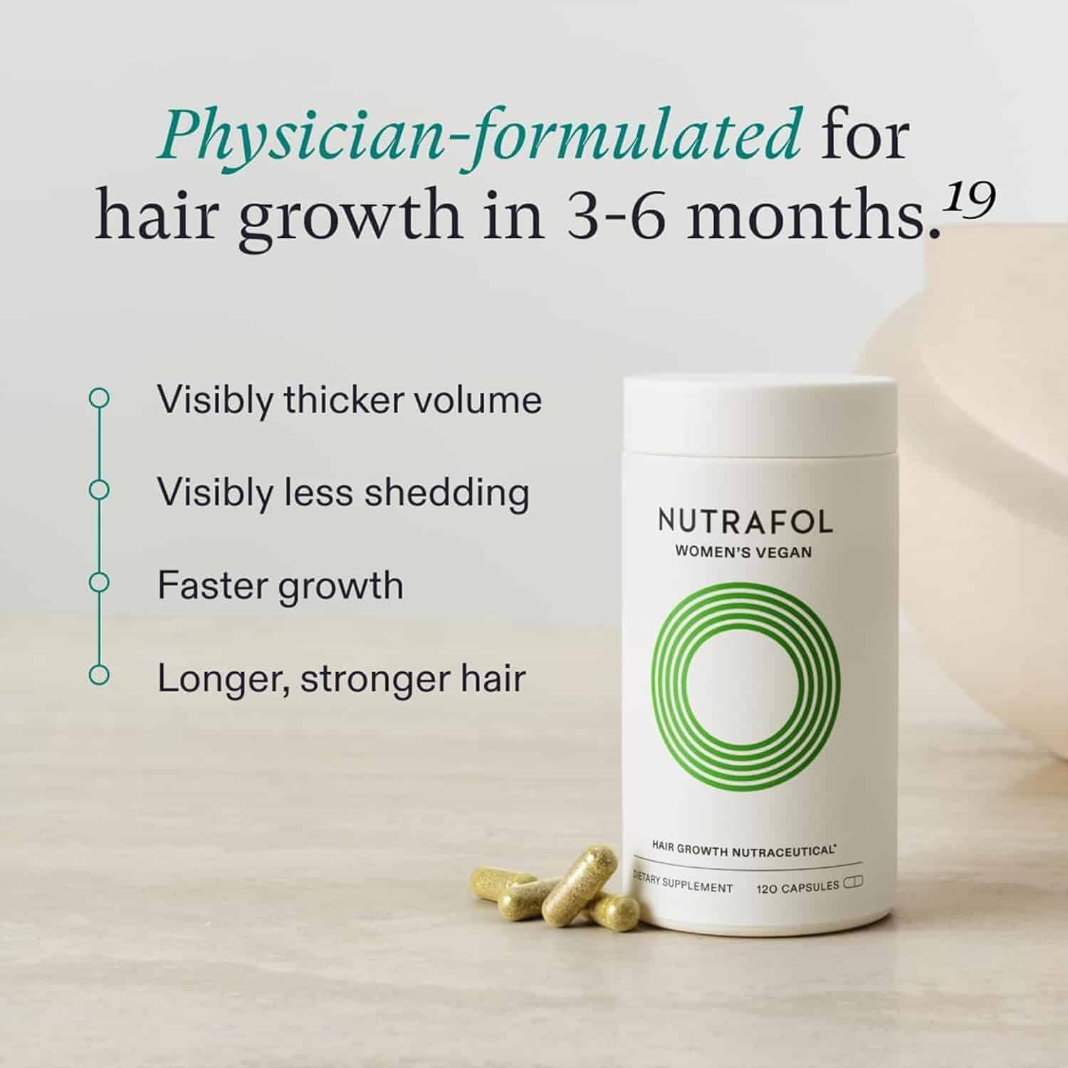 Nutrafol women's vegan hair growth supplement bottle with loose capsules